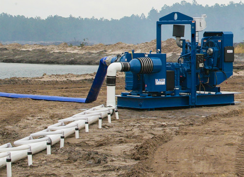blue de-watering pump on job site