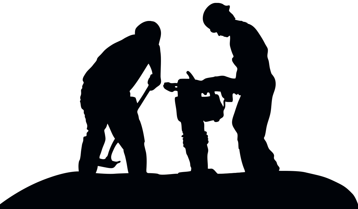 a silhouette of two construction workers digging and drilling