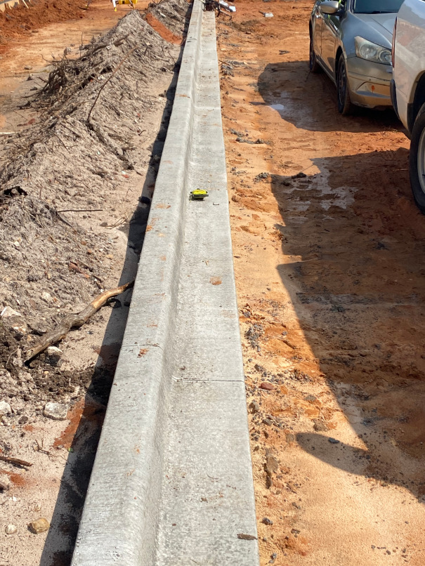 services/concrete/curbing/chavers_construction_curbing_eglin_credit_union.jpeg