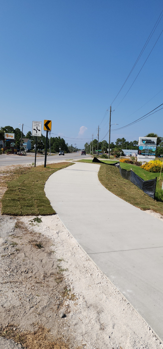 services/concrete/sidewalk/chavers_construction_sidewalk_perdido_workers_finish.jpg